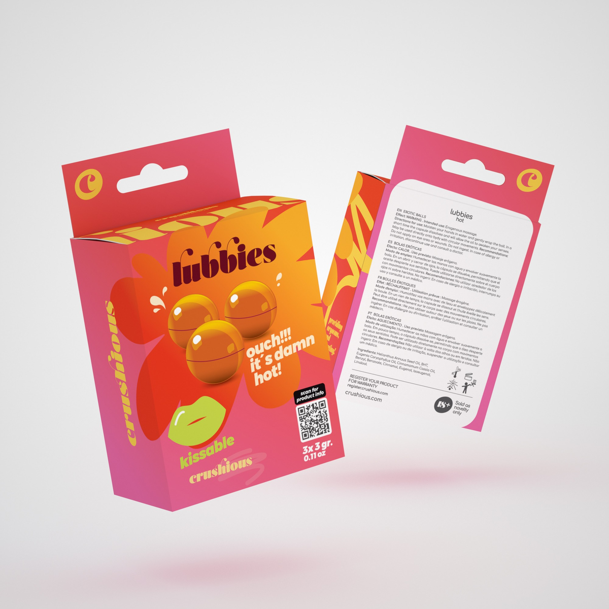 Product packaging shot showing the front and back of the bright pink and orange Crushious Lubbies Hot Oil Balls box containing three 3 g bath/massage spheres, featuring multi-language instructions and ingredient information on the reverse side. Main image
