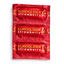 Direct top-down view of a 3-pack strip of EuroGlider Strawberry condoms in metallic red foil packaging with yellow branding and CE markings.