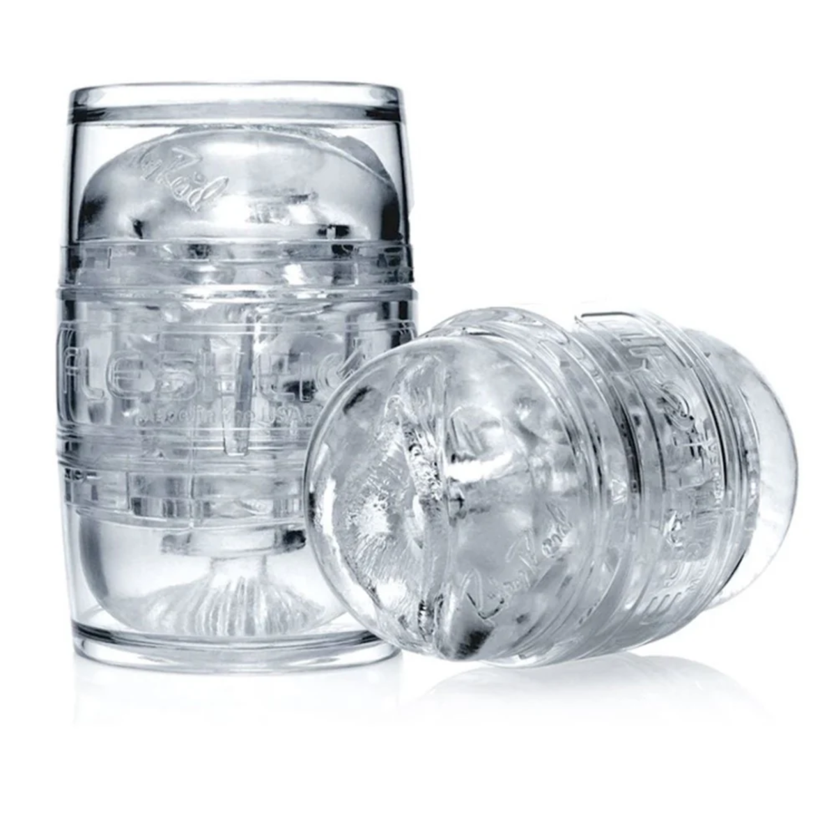 Two clear Riley Reid Fleshlight Quickshot masturbators, one standing upright and one lying horizontally.