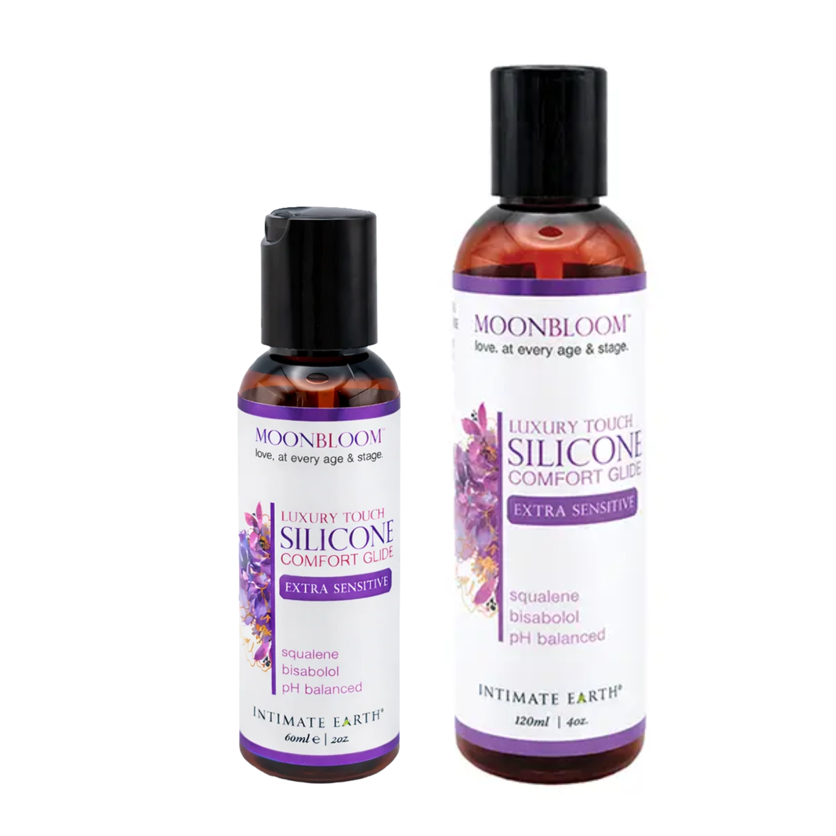Size comparison view showing two amber bottles of Intimate Earth Moon Bloom silicone comfort glide standing side by side in 60 ml (2 fl oz) and 120 ml (4 fl oz) capacities.