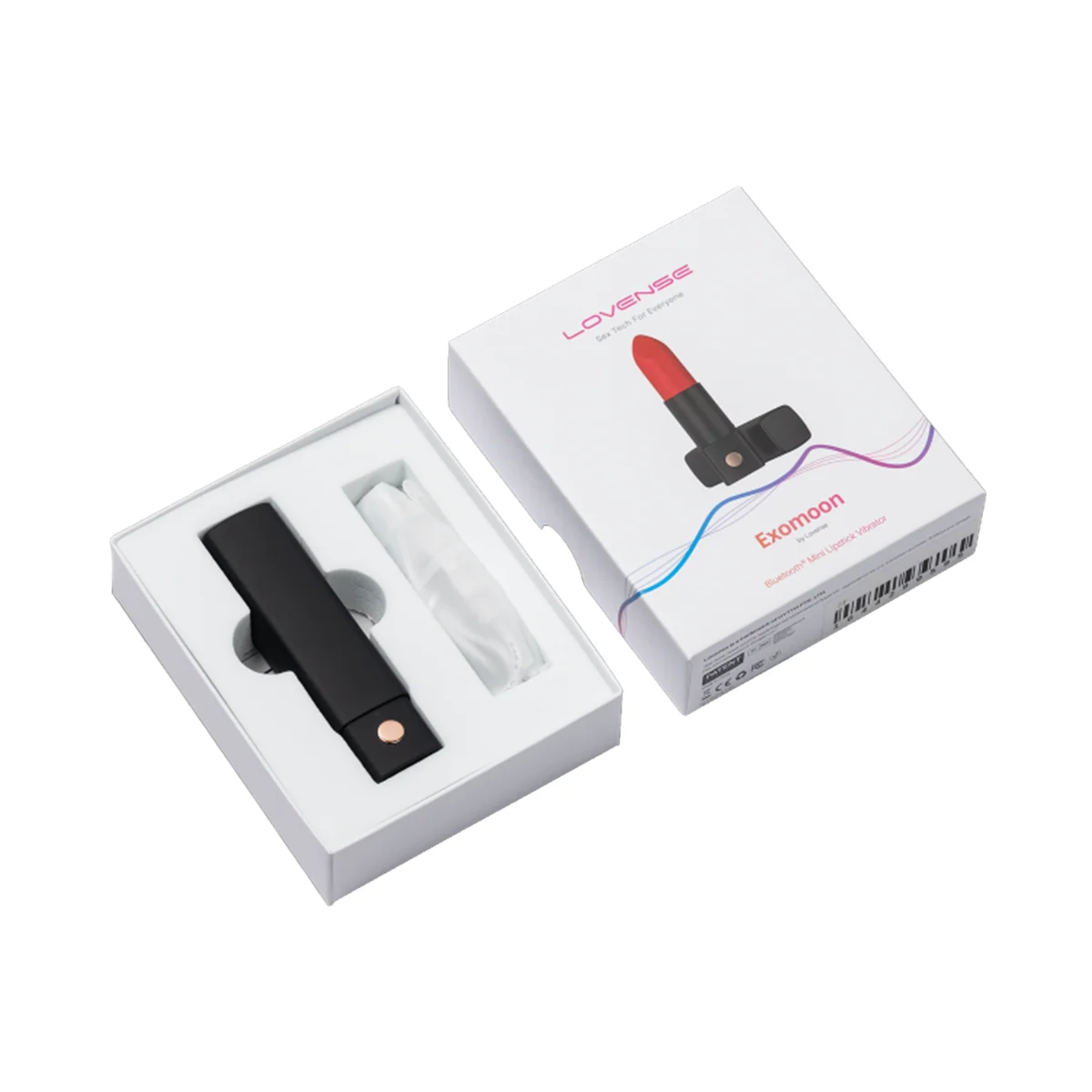 Unboxing photo showing the capped Lovense Exomoon vibrator and USB charging cable in white tray packaging next to the box lid.