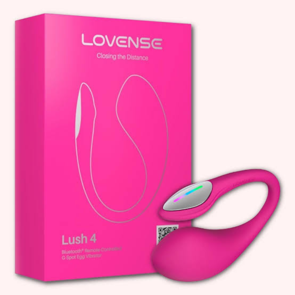 Product set view showing the curved pink Lovense Lush 4 egg vibrator standing next to its bright pink box.