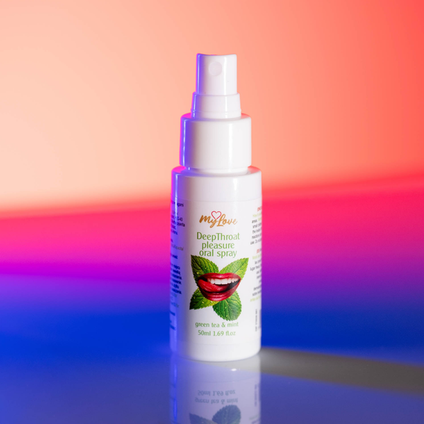 Front view of the 50 ml MyLove Deep Throat Pleasure Oral Spray bottle illuminated under dynamic pink and blue studio lighting.