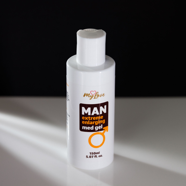 Front-angle view of the 150 ml MyLove Man Extreme Enlarging Med Gel bottle standing on a white reflective surface against a solid black backdrop with soft side lighting.