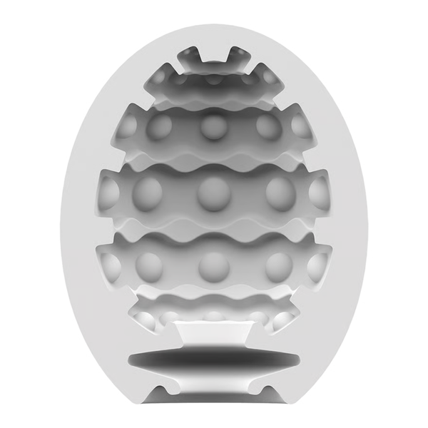 Cross-section view of the flexible white silicone inner sleeve for the Satisfyer Bubble Masturbator Egg, revealing its internal pattern of raised spherical nubs for stimulation.