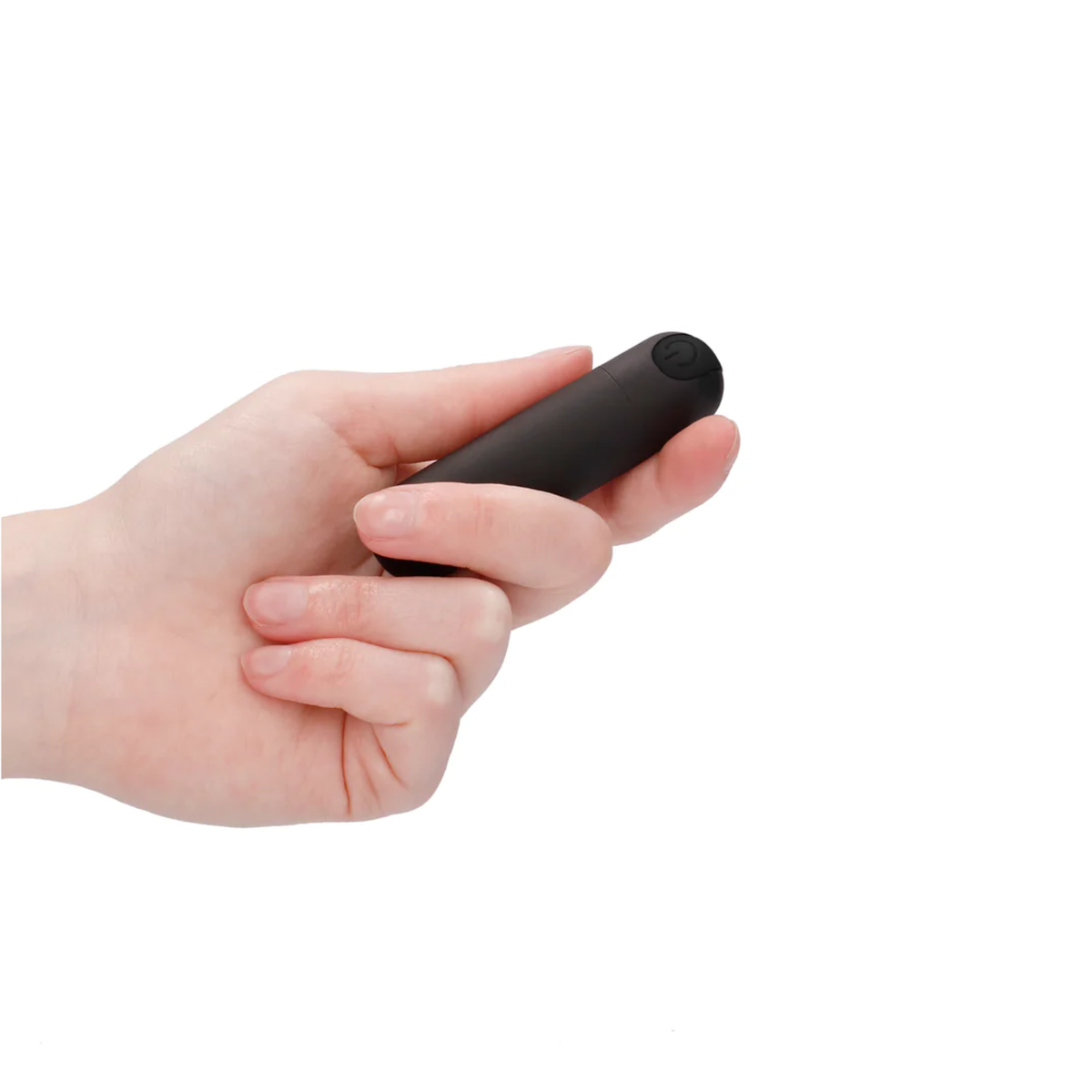 A hand holding the black bullet vibrator, showing its small, discrete size.