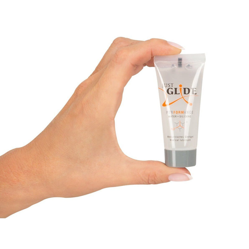 Woman hand holding Just Glide Performance 20ml Tube Lubricant